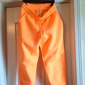Neon orange joggers